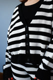 the sleek stripe buttoned up top