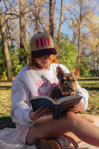 bookish maroon trucker hat