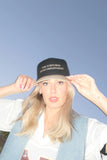 tortured moms department trucker hat